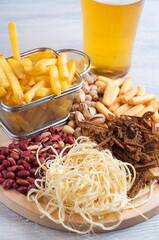 beer snacks: peanuts, pistachios, croutons, cheese, French fries
