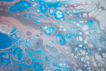 Fluid art paint texture, acrylic pouring painting closeup, top view of paint splashes on canvas, water texture, blue and white paint drips
