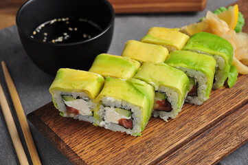 avocado sushi roll with salmon cucumber and cream cheese