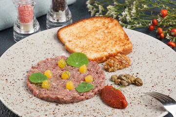 beef tartare with mushroom caviar and red pepper mousse