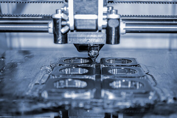 Modern 3D printer printing figure close-up. Automatic three dimensional