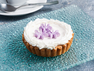 tasty sour cream cupcake with shortbread blueberries