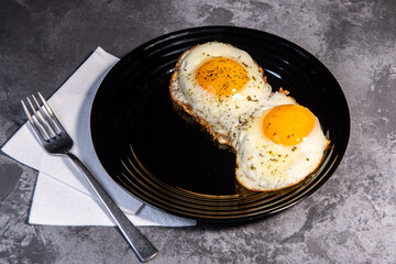 fried eggs, delicious breakfast, snack, yolk and protein food, background, top view, copy space, eat healthy raw. Scrambled eggs. Close-up
