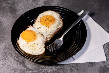 fried eggs, delicious breakfast, snack, yolk and protein food, background, top view, copy space, eat healthy raw. Scrambled eggs. Close-up