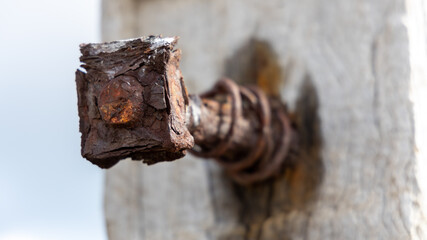 A rusted bolt remaining in the posts atthe myponga jetty ruins on the fleurieu peninsula south...
