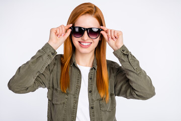 Photo of positive nice orange hair lady touch spectacles wear grey shirt isolated on white color background