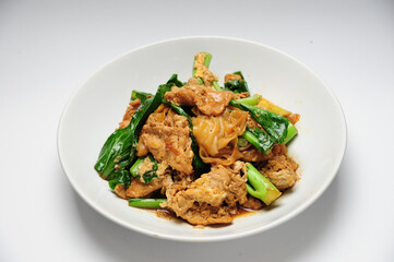 Stir-fried rice noodle with black soy sauce and pork and kale - Asian food style