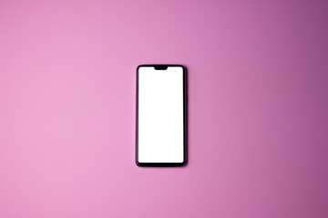 A phone with a white screen. Phone on a pink background. Free space on the phone screen.
