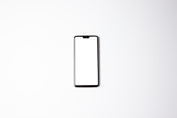 A phone with a white screen. Phone on a white background. Free space on the phone screen.