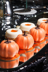 handmade sweets on a mirror on a dark background