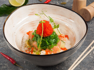 poke with salmon in mango sauce. Asian cuisine