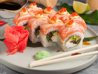 sushi rolls with salmon, cream cheese and avocado