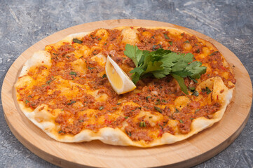 lahmacun is a Turkish dish similar to a pizza
