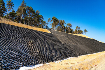 Metal mesh to strengthen the slope of the road