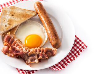 Traditional American breakfast with fried egg,toast,bacon and sausage isolated on white background
