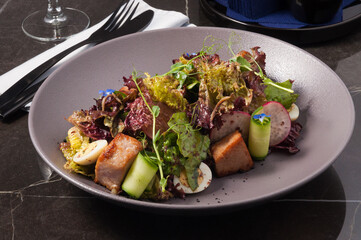 tasty salad with fried tuna and fresh vegetables