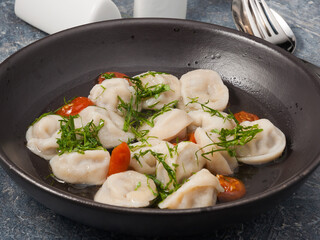 Russian dumplings made of marbled beef in broth
