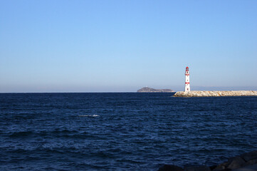 Panoramic view of a lighthouse at the coast of Turgutreis, Bodrum, Turkey. 