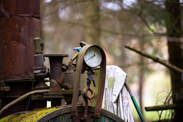 Pressure gauge on an illegal installation for the production of moonshine (alcohol). Photo taken in...