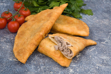 tasty Little Russian pies with meat posikunchiki