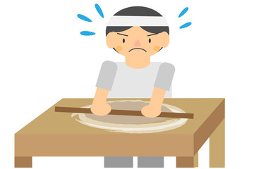 蕎麦職人が蕎麦を伸ばしている