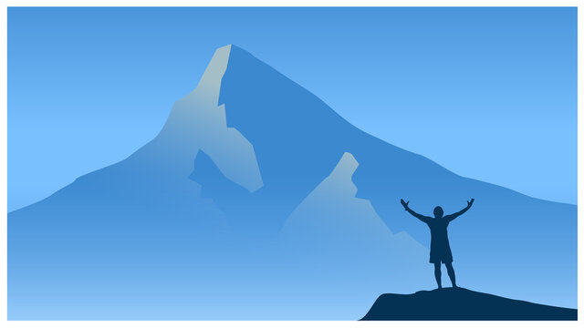 silhouette of a person in the mountains