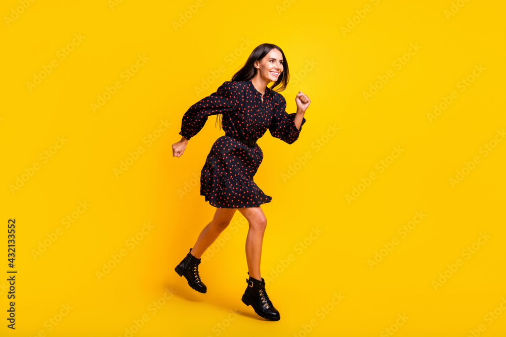 Sticker Full length body size view of attractive cheerful girl jumping running motivation isolated over bright yellow color background