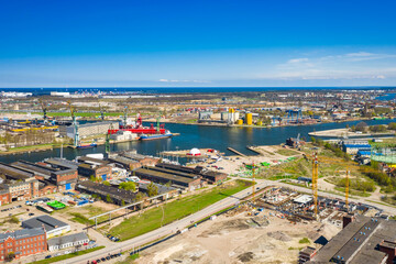 Fototapeta premium Aerial view of city center in Gdansk with shipyard area. Poland