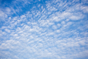 blue sky with clouds and texture