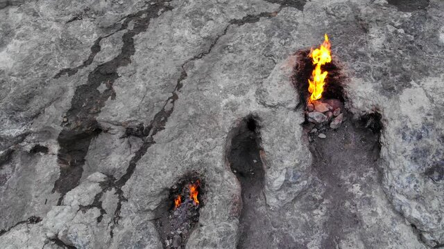Aerial Shot of Geological feature on the Yanartas Chimera mountain in Turkey on the slope of which natural gas burns continuosly