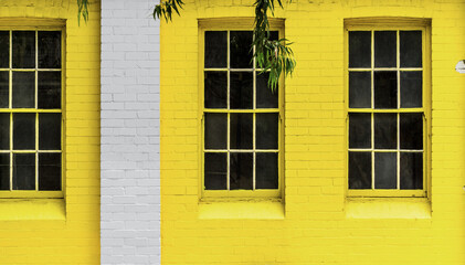 Fototapeta na wymiar Yellow and Grey Brick Wall.