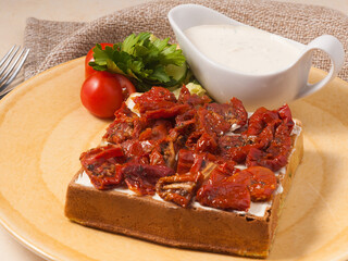 Belgian waffle with sun-dried tomatoes and cottage cheese