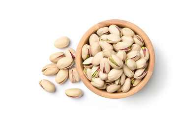 Flat lay of pistachio nuts in wooden bowl isolated on a white background. Clipping path.