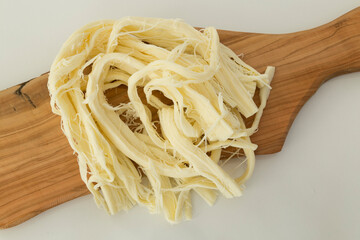 Turkish Cecil cheese on wooden background.