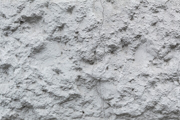 Gray stone background, textured stone, close-up of concrete wall