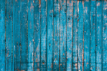 Fototapeta na wymiar blue bright old wooden fence