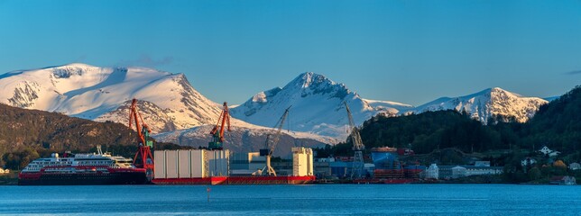 ULSTEINVIK, NORWAY - 2020 MAY 19. Arctic explore cruise vessel at ship yard with white snowdy...