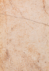 Dark yellow tile with abstract stripes, textured rusty background, street wall in close-up