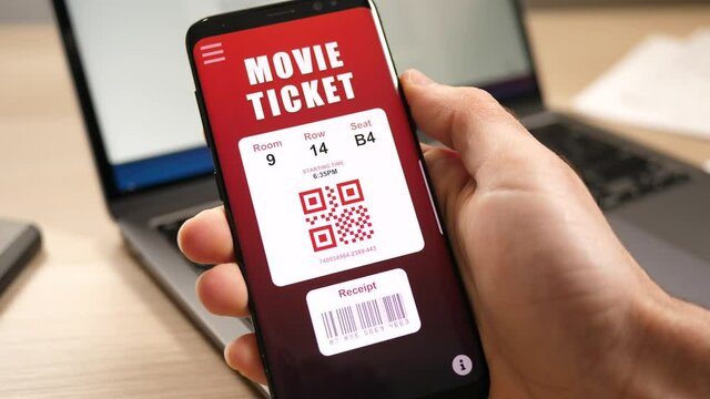 Virtual digital movie ticket with a QR code on a mobile phone