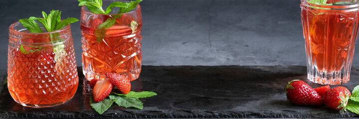 Refreshing summer drink with strawberry and mint