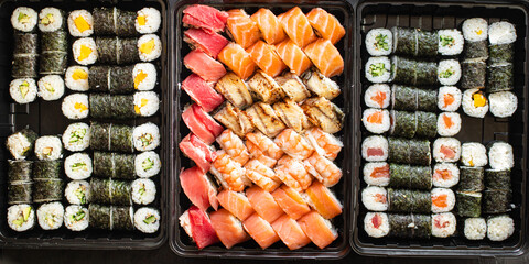 sushi roll seafood maki salmon, tuna, rice, nori asian cuisine meal snack copy space food background rustic. top view © Alesia Berlezova
