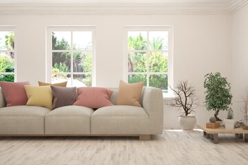 White living room with sofa and summer landscape in window. Scandinavian interior design. 3D illustration