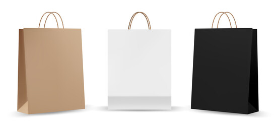 Fototapeta Shopping bag mockups. Paper package isolated on white background. Realistic mockup of craft paper bags. obraz