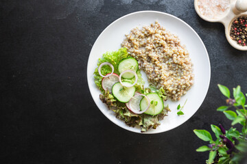 green buckwheat salad vegetables lettuce mix meal snack copy space food background rustic. top view keto or paleo diet vegan or vegetarian food