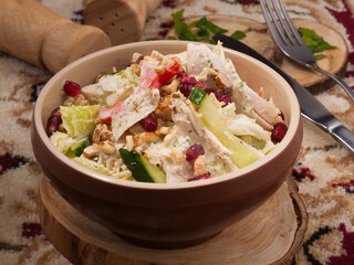 Georgian salad with vegetables and chicken. Close up
