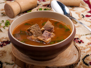 traditional Georgian kharcho soup with beef. Close up