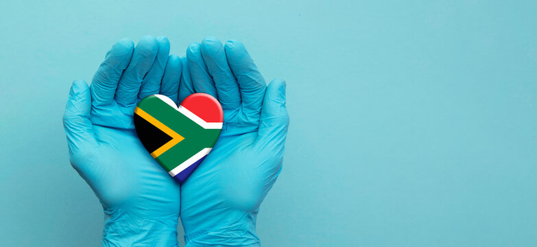 Doctors Hands Wearing Surgical Gloves Holding South Africa Flag Heart