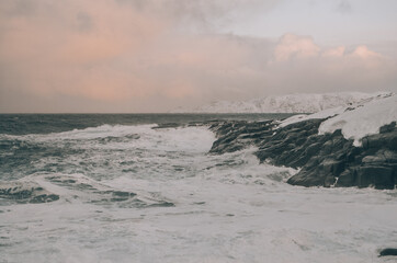 waves breaking on the beach