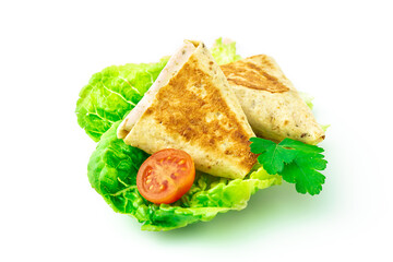 Triangular tortilla with sausage and cheese on green cabbage leaf with cherry tomato, on white background, isolated with shadow