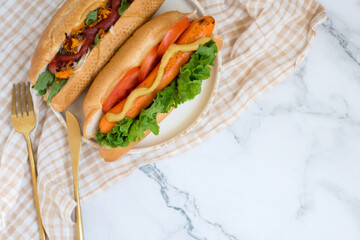 vegetarian hot dog with carrots.